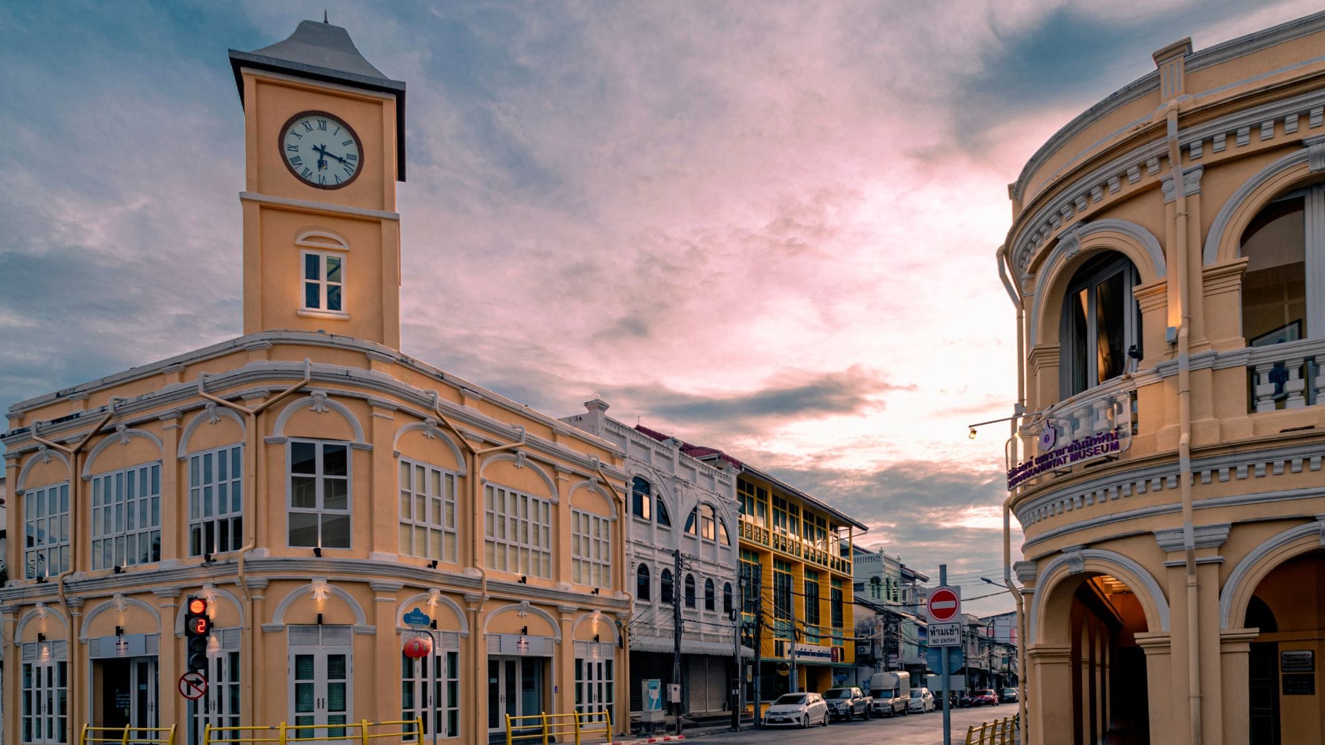 Sino-Portuguese buildings and clock tower in Phuket Old Town at sunset